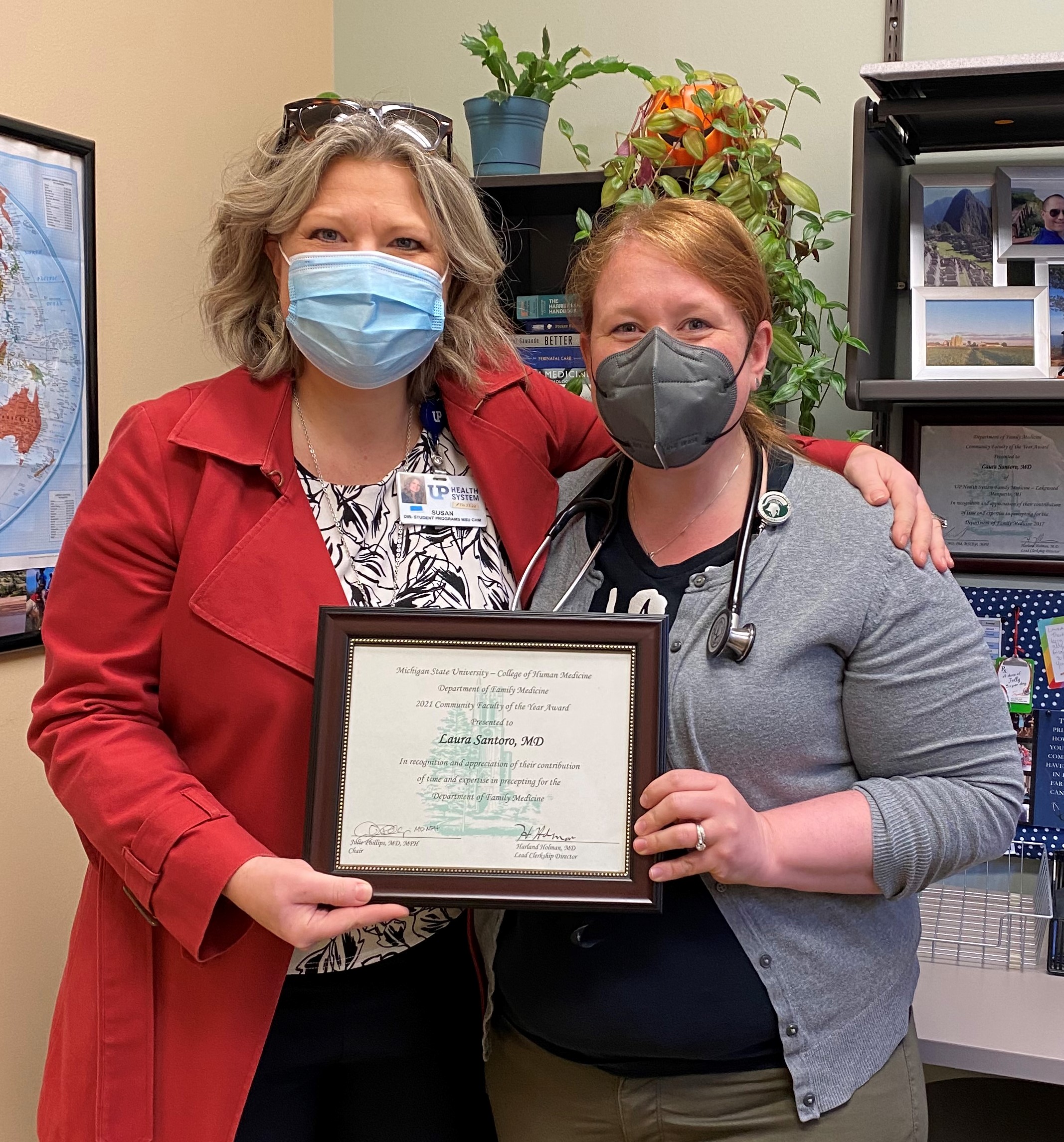 Dr. Laura Santoro receiving the UP Family Medicine Preceptor of the year award.