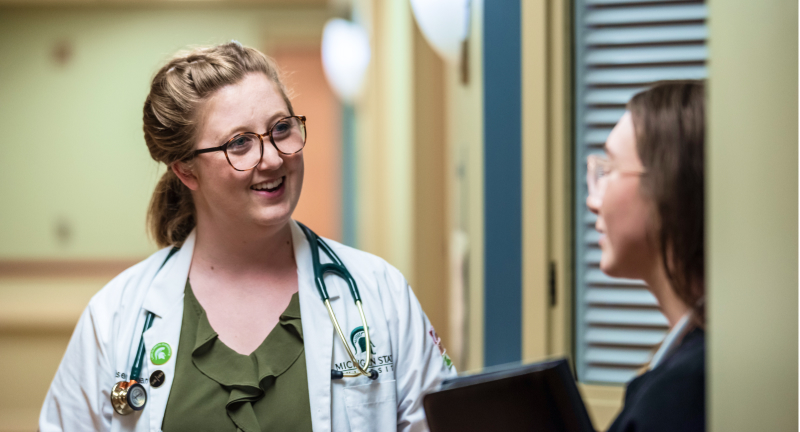 Doctors talking in a hallway
