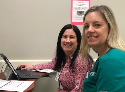 Nurse Manager, Jen Preece and Health Care Assistant, Kismet Lock, welcome the first virtual patient in the Telehealth-Family Health Center.