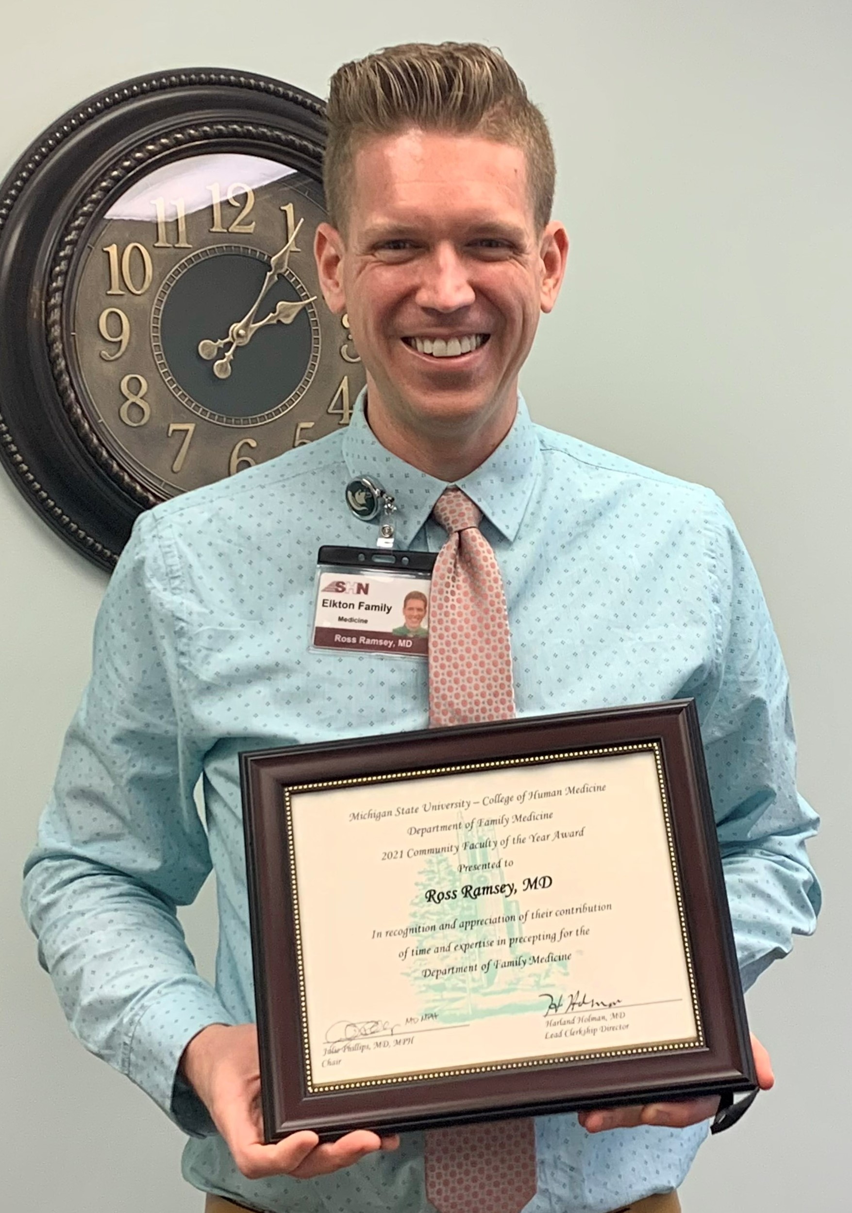Dr. Ross Ramsey receiving the Mid-Michigan Family Medicine Preceptor of the Year award